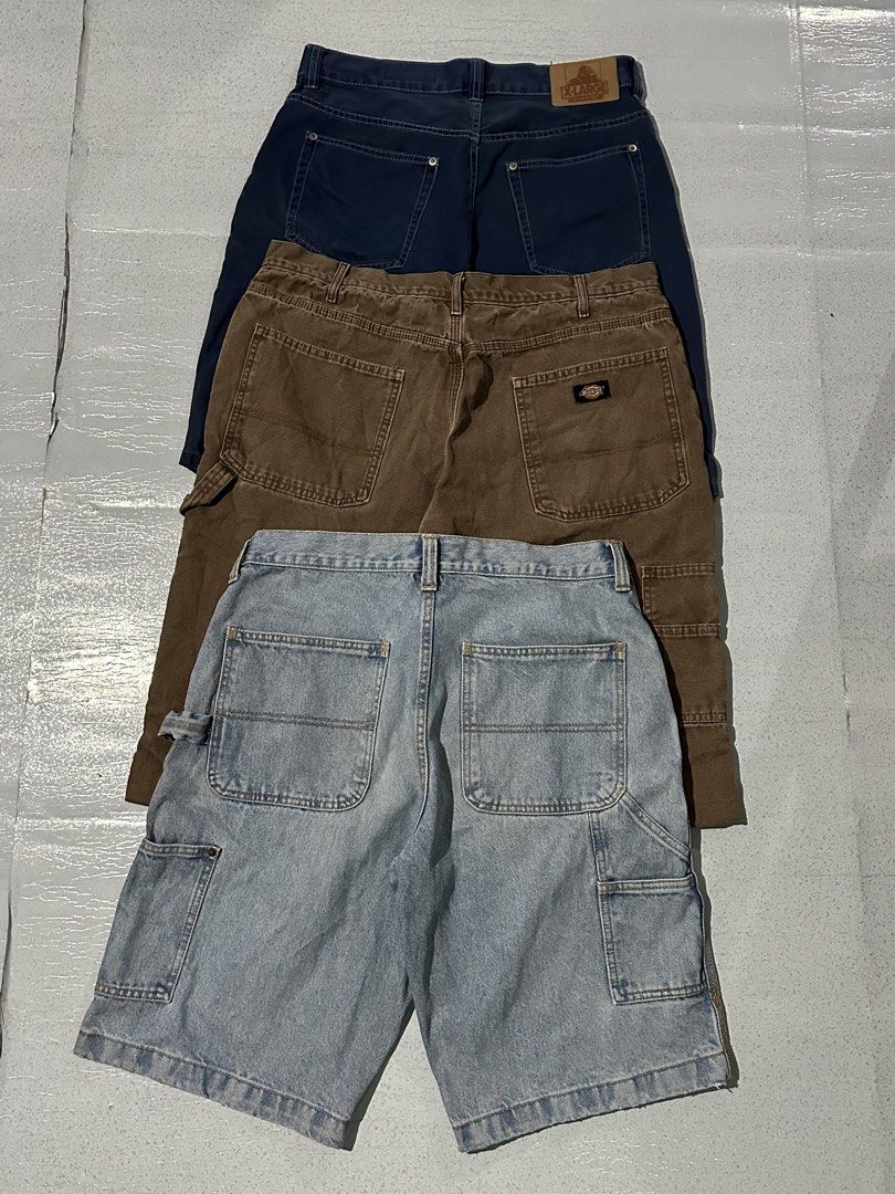 Dickies & X-Large Denim and Cargo Shorts Bundle (Category: Shorts) located in Manila. Submitted by jeproxthrift (Listing ID 1467811048, Image 1). Description: - Bundle of 3 heavy-duty shorts for daily wear or skating - Pair 1: Brown Dickies carpenter shorts with utility pockets - Pair 2: Light wash denim carpenter shorts featuring a hammer loop - Pair 3: Dark blue X-Large shorts with contrast stitching and leather brand patch - Made with durable,