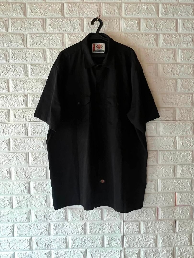 Dickies Black Short Sleeve Work Shirt (Category: Tshirts & Polo Shirts ) located in Cebu City. Submitted by chrisjayma26571 (Listing ID 1467644751, Image 1). Description: - Brand: Dickies - Color: Black - Style: Short sleeve button-down work shirt - Fit: Regular fit - Details: Collar neckline, front button closure, double chest pockets with classic logo patch, woven label near hem - Material: Heavyweight durable workwear fabric - Condition: Clean