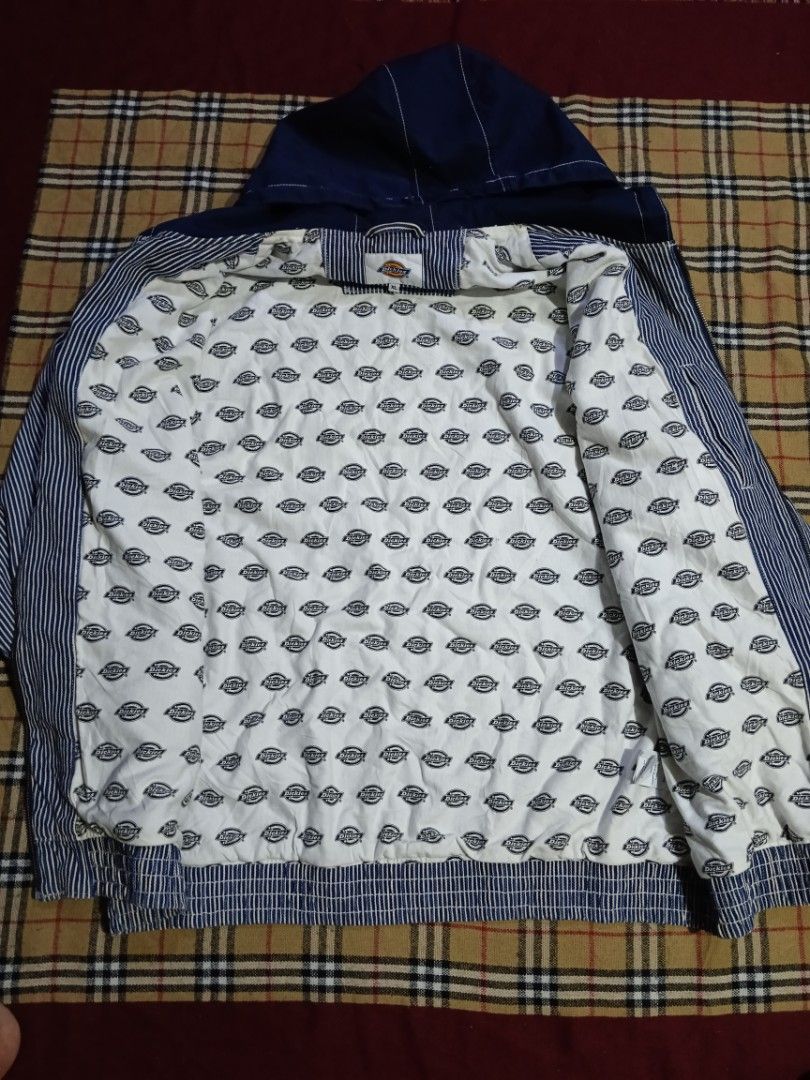 Dickies Hickory Stripe Hooded Jacket (Category: Coats, Jackets and Outerwear) located in General Santos City (Dadiangas). Submitted by freehorse.5f2a61 (Listing ID 1467651191, Image 3). Description: - Brand: Dickies - Style: Hickory stripe hooded jacket - Color: Blue and white - Size: XL - Material: 100% cotton shell with polyester blend hood and pockets - Details: Full zip front, solid blue hood, contrast front pockets, and all-over Dickies logo