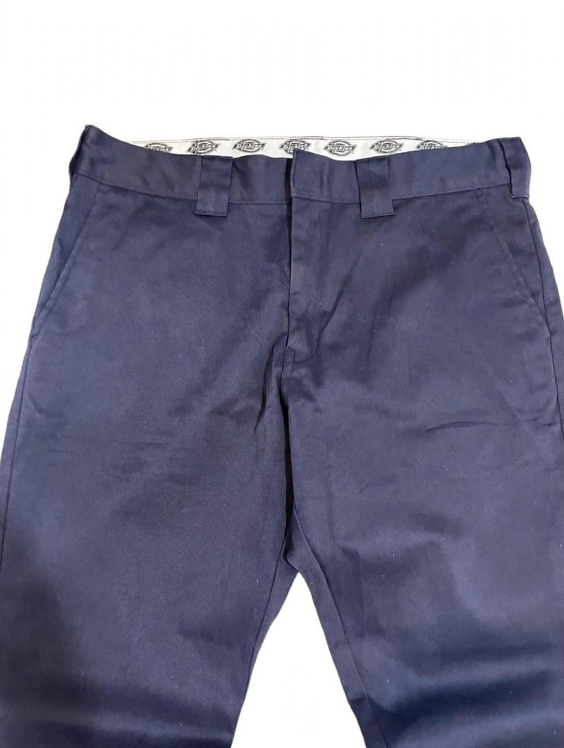 Dickies Navy Blue Chino Pants (Category: Chinos) located in Cainta. Submitted by mariss.luxx (Listing ID 1467651116, Image 3). Description: - Brand: Dickies - Color: Classic navy blue - Fit: Straight leg, versatile for casual wear or daily use - Material: Sturdy twill fabric with structured belt loops - Details: Branded inner waistband lining and signature Dickies logo patch on the back right pocket - Pockets: Functional rear welt pockets -W:36 L