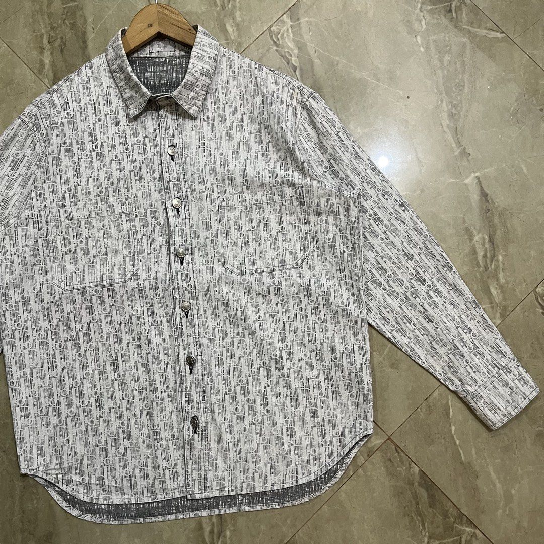 DIOR OBLIQUE LOGO BUTTON UP POCKET SHIRT (Category: Luxury Apparel) located in Marikina City. Submitted by arniejane23 (Listing ID 1467696927, Image 3). Description: DIOR OBLIQUE LOGO BUTTON UP POCKET SHIRT SIZE MEDIUM to SEMI LARGE DIMENSION width - 22.5 length - 28 NO ISSUE/NO FLAWS EXCELLENT LIKE NEW CONDITION!!.
