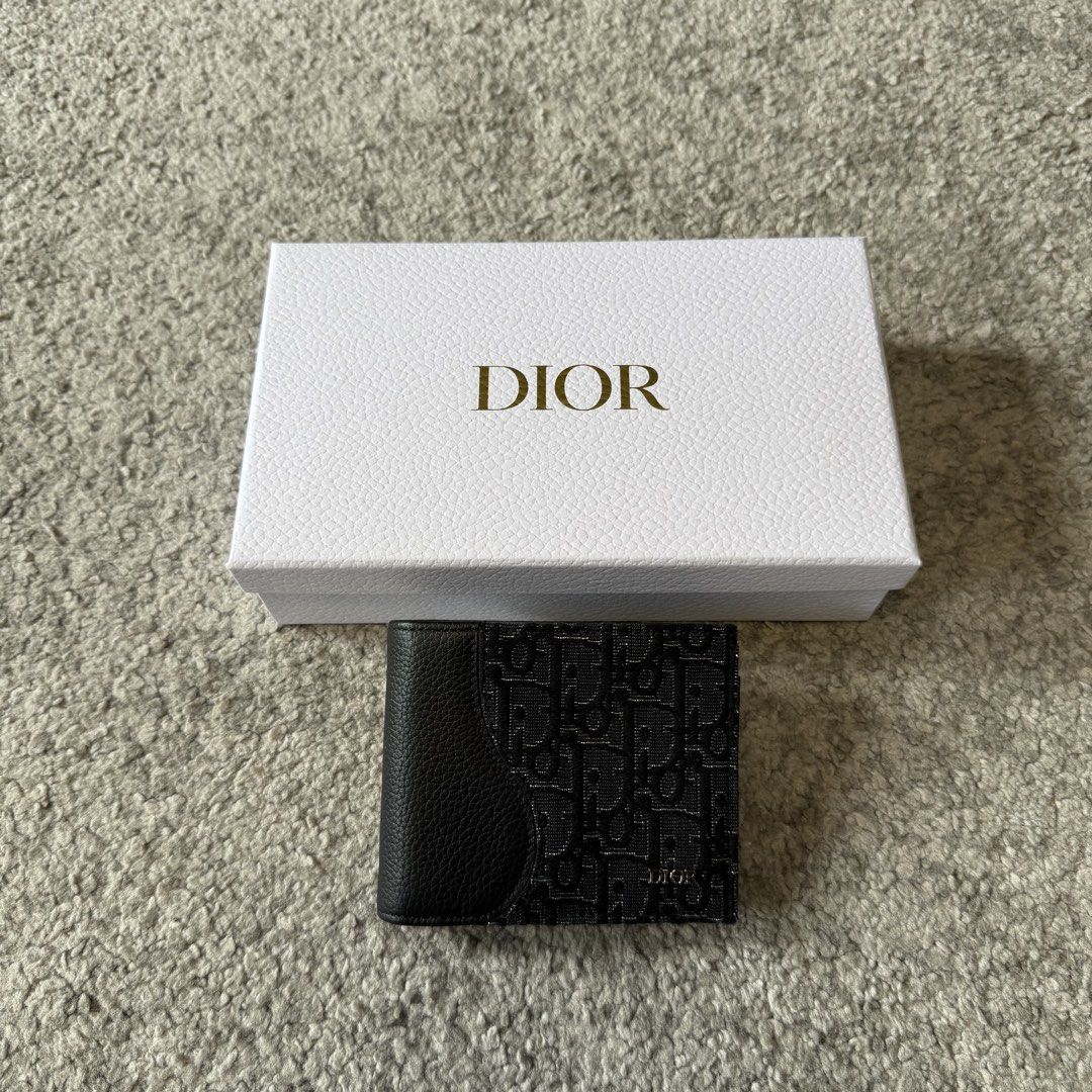 Dior Saddle Bifold Wallet Black/Silver (Category: Luxury Bags & Wallets) located in Paranaque City. Submitted by nego.allday (Listing ID 1467667392, Image 1). Description: Dior Saddle Bifold Wallet Black/Silver Brandnew | Complete ₱35,000 (SRP 60k).