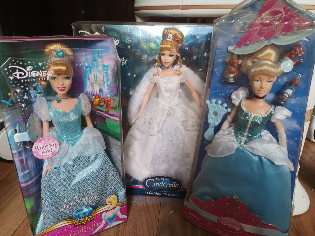 Disney Princess Cinderella Doll Collection (Category: Figurines & Statues) located in Naga. Submitted by cosmicrabbit.09254a (Listing ID 1467708617, Image 1). Description: - Set of 3 Disney Cinderella dolls in unopened, original packaging - Gemini Princess edition: features a sparkly blue gown and tiara - Holiday Princess edition: dressed in a white winter dress - Disney Store exclusive: comes with tiny mouse sidekicks and a mirror accessory - Gr