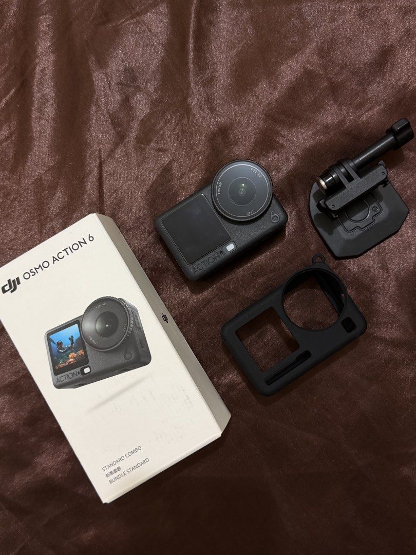 DJI Osmo Action 6 Standard Combo (Category: Video Cameras) located in Pateros City. Submitted by natemontie (Listing ID 1467801163, Image 1). Description: Selling my DJI Osmo Action 6! 💗 Bought: April 2026 Only 6 months used Seldom used, mostly nakatambay lang Sobrang kinis, well taken care of No issues, smooth na smooth ang performance Complete with box and receipt FREEBIES: ✨ Silicone case ✨ Magnetic mount RFS: Decluttering / upgrade Sobrang a