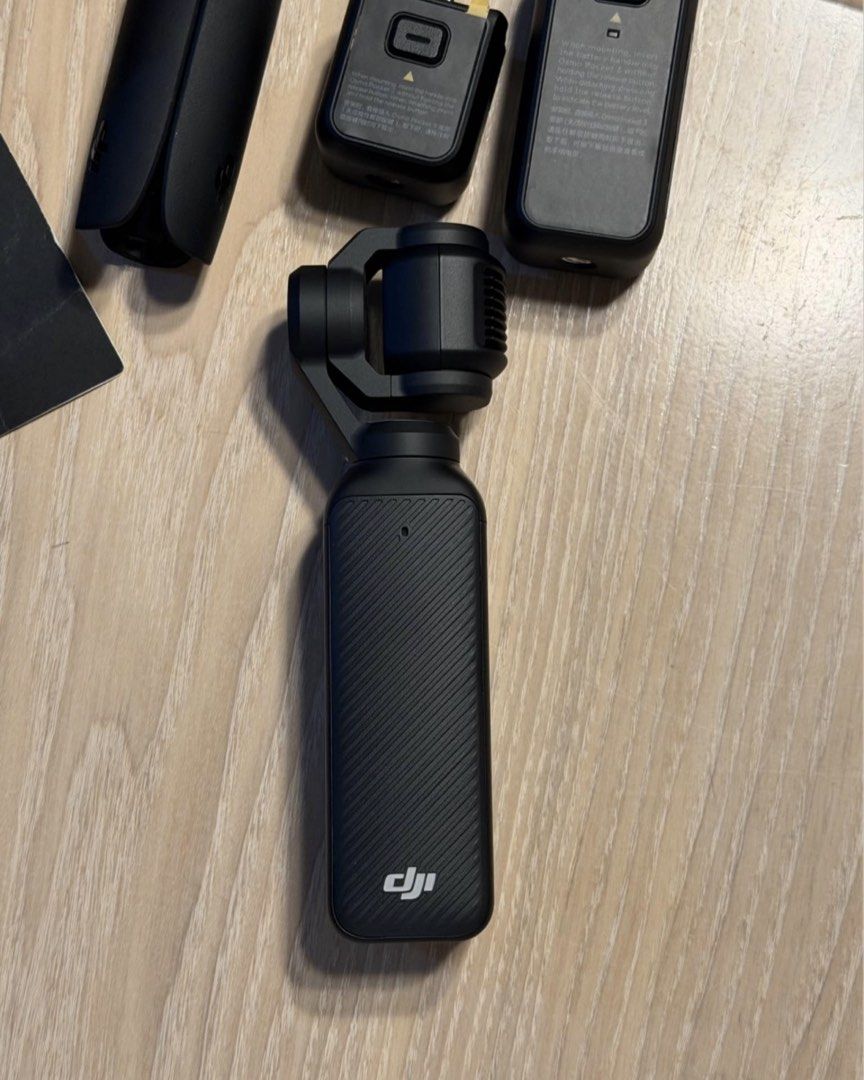 DJI Osmo Pocket 3 Creator Combo (Category: Cameras) located in Pasig City. Submitted by aizabeecaren (Listing ID 1467683698, Image 3). Description: - Item: DJI Osmo Pocket 3 Creator Combo (Fully functional) - Camera Features: Rotating touchscreen, wide-angle lens attachment - Power & Support: Battery handle, mini tripod - Audio: DJI Mic 2 transmitter with fuzzy windscreen - Accessories: USB-C cable, custom carrying bag with internal dividers - In