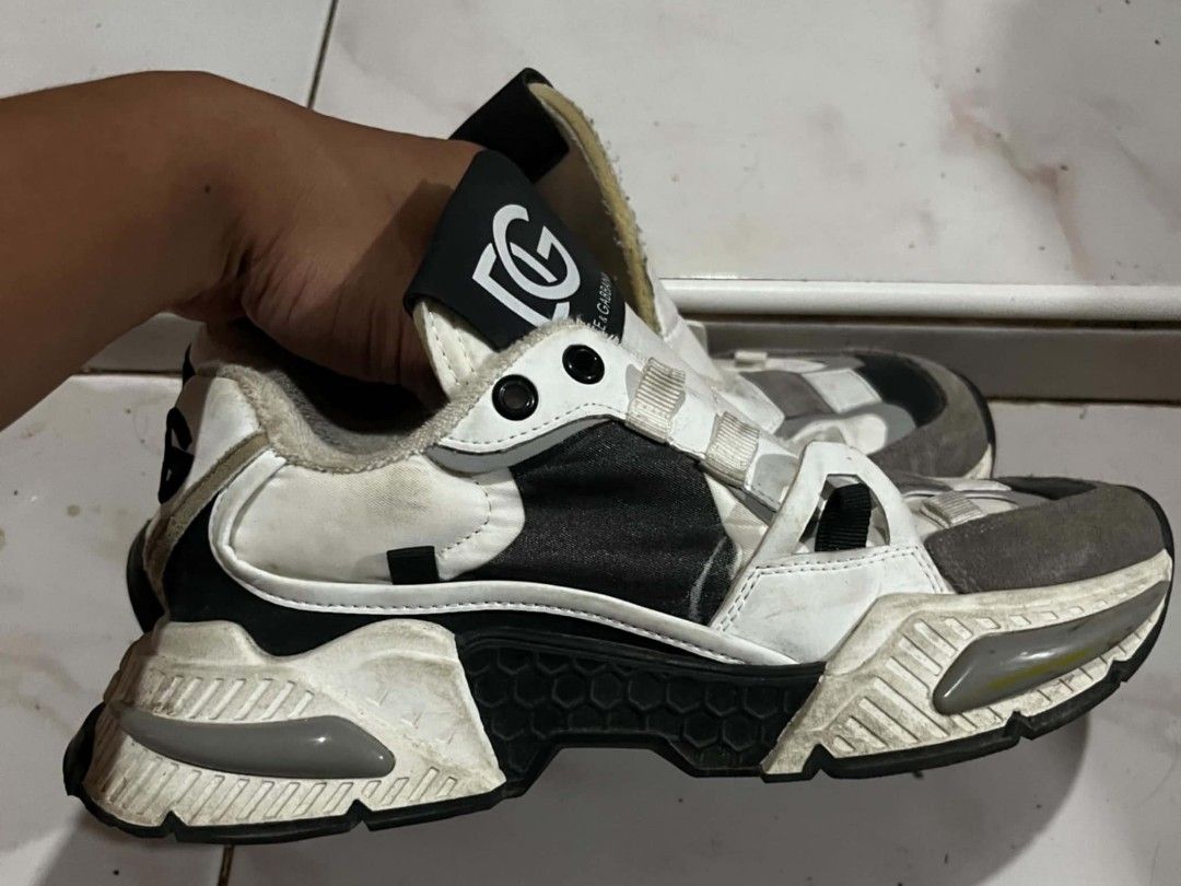 Dolce & Gabbana Sorrento Sneakers (Category: Sneakers) located in Baroy. Submitted by laudecarlfe24 (Listing ID 1467733293, Image 1). Description: - Brand: Dolce & Gabbana - Style: Chunky sneakers with honeycomb sole pattern - Colorway: White, Black, and Grey - Size: 38 (Made in Italy) - Branding: Bold DG logo on tongue and bottom sole - Condition: Noticeable scuffs and dirt marks from previous wear, tons of life left - Perfect for street style e