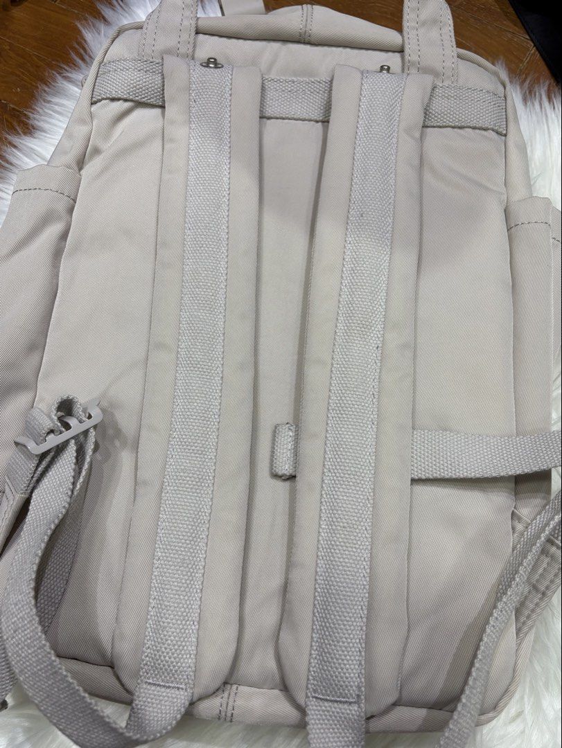 Doughnut Backpack (Category: Backpacks) located in Singapore. Submitted by allfromsg (Listing ID 1467775952, Image 5). Description: Authentic Doughnut backpack Free tracked delivery Slight stain 27cm W x 13cm D x 38cm H 420D Crinkle Nylon Twill Water Repellent Water Bottle Compartment Up To 14-Inch Laptop Compartment Padded Adjustable Shoulder Straps Real Leather Trimming .