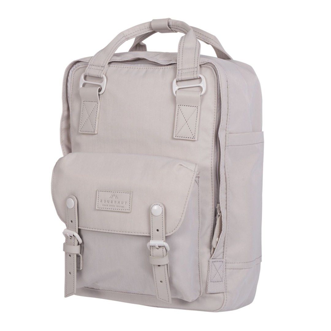 Doughnut Backpack (Category: Backpacks) located in Singapore. Submitted by allfromsg (Listing ID 1467775952, Image 1). Description: Authentic Doughnut backpack Free tracked delivery Slight stain 27cm W x 13cm D x 38cm H 420D Crinkle Nylon Twill Water Repellent Water Bottle Compartment Up To 14-Inch Laptop Compartment Padded Adjustable Shoulder Straps Real Leather Trimming .