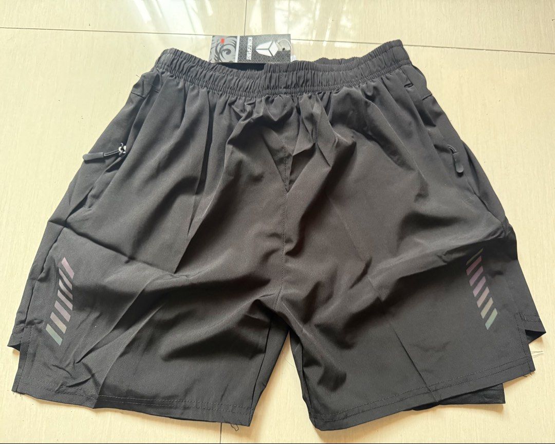 Dri-Fit 2-in-1 Shorts (Category: Shorts) located in Paranaque City. Submitted by otvgreatness (Listing ID 1467637928, Image 2). Description: Dri-Fit Shorts with Compression Liner With 2 Zipper Pockets Colors: Navy Blue Black Size XL on tag P 350.00 each Dimensions Waist - Fits 32 to 34 Length - 18 inches (46 cm) Meet-ups: Moonwalk, Paranaque area..