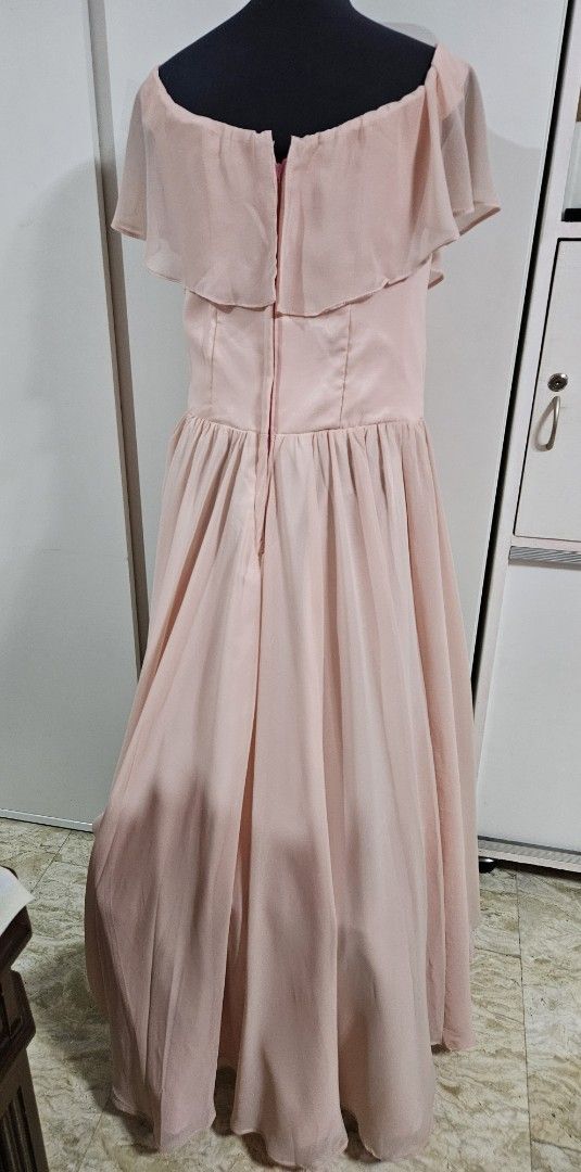 Dusty Pink Off-Shoulder elegant gown (Category: Evening dresses & gowns) located in Caloocan City. Submitted by rm.diaz (Listing ID 1467756328, Image 2). Description: - Dusty pink long gown - Off-shoulder neckline with short flutter sleeves - Flowy chiffon - Fitted waistline with back zip closure - Worn only once, freshly dry cleaned and ready to wear - Measurements available upon request (just send a message!).