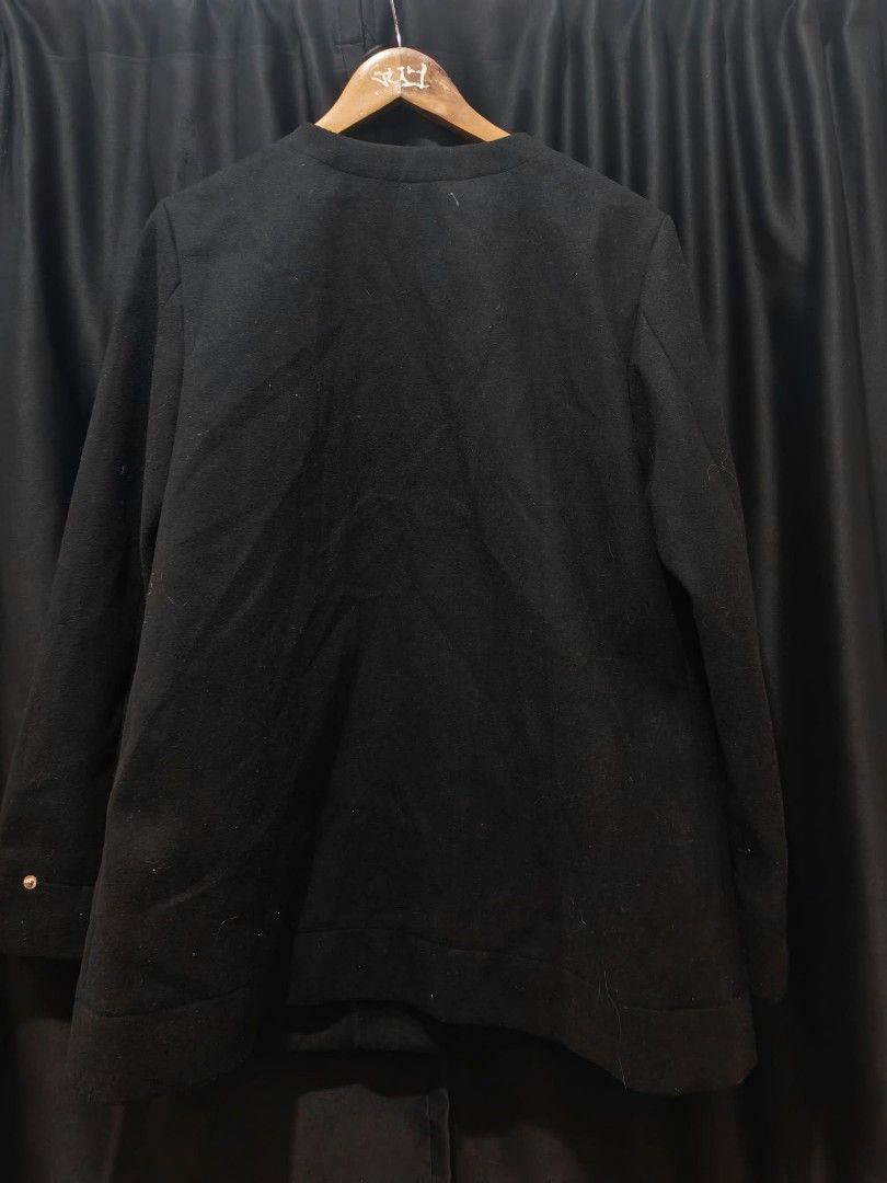 EA7 Emporio Armani Black Coat Jacket (Category: Coats, Jackets and Outerwear) located in Baguio. Submitted by solo_ukay (Listing ID 1467788095, Image 2). Description: - Brand: EA7 Emporio Armani - Color: Solid black - Neckline: Crew neck with hidden button front closure - Pockets: Convenient front flap pockets at the hips - Cuffs: Adjustable strap details with buttons on the sleeves - Branding: Subtle tonal rubber logo badge on the left sleeve - 