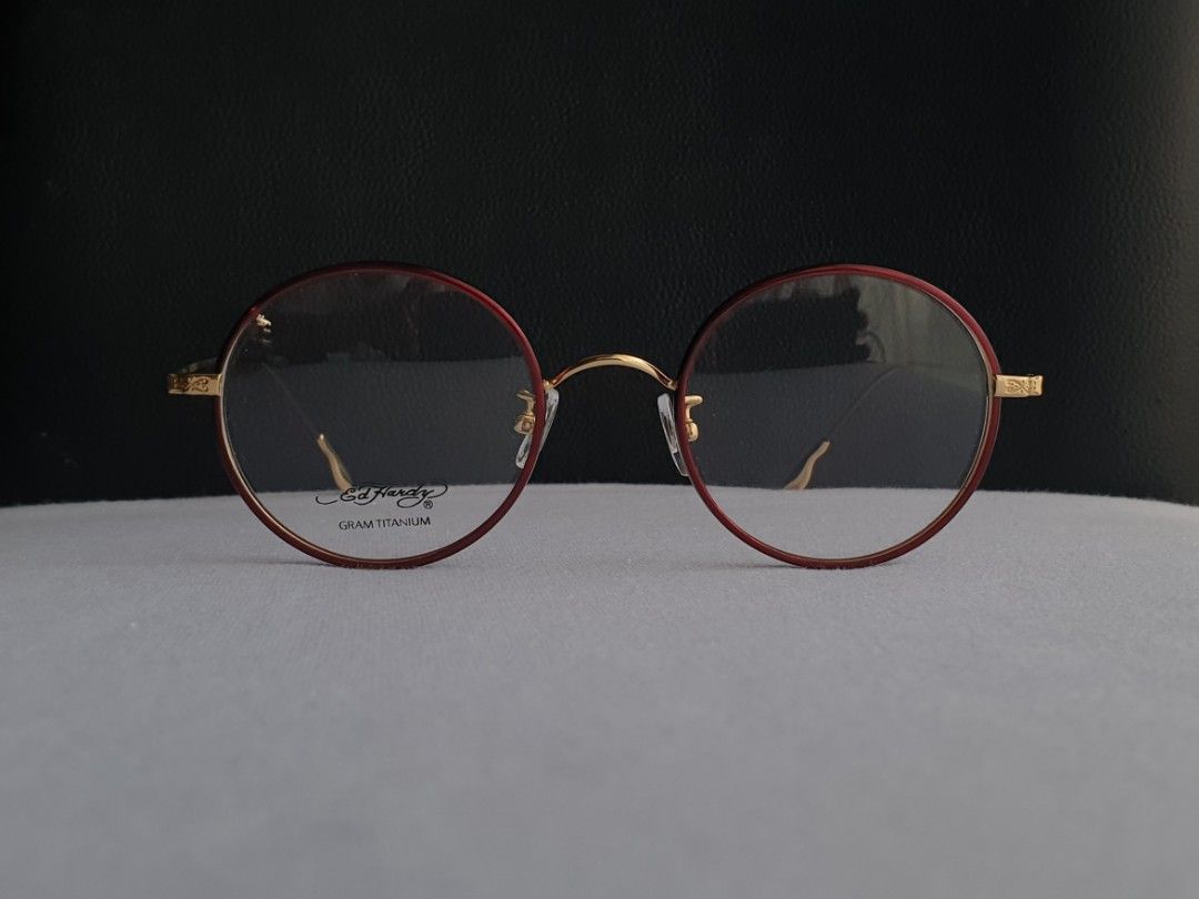 Ed Hardy Round Titanium Eyeglass Frame (Category: Sunglasses & Eyewear) located in Quezon City. Submitted by WasalakTwo (Listing ID 1467786799, Image 2). Description: New, old stock from Japan Durable and high quality Goodcondition Open for delivery nationwide Front Width 13.8cm Front Height 4.8cm.