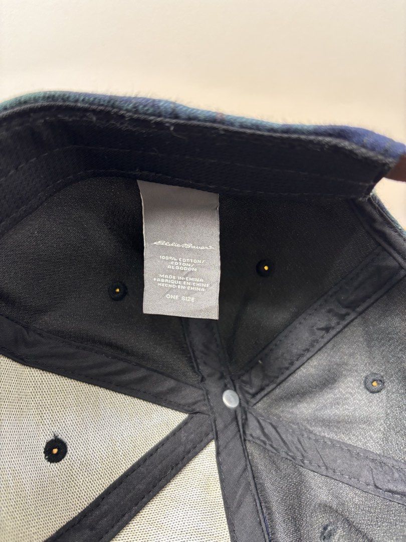 Eddie Bauer Green Tartan Plaid Baseball Cap (Category: Caps & Hats) located in Marikina City. Submitted by zaxcheus_castillo1708 (Listing ID 1467654062, Image 3). Description: - Brand: Eddie Bauer - Design: Green and blue tartan plaid, classic six-panel - Details: Front woven logo patch, brown adjustable strap with metal hardware - Material: 100% cotton for a comfortable fit - Size: One size fits most - Condition: Clean inside and out, ready to w