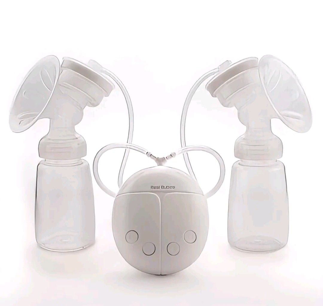 Electric Breast Pump (Category: Breastfeeding & Bottle Feeding) located in Pasay City. Submitted by elysh_ (Listing ID 1467707215, Image 1). Description: - Double electric breast pump with dual bottles, tubing, and compact round control unit - Powered by standard 5V 1A USB supply - Compatible with power banks, USB wall adapters, laptops, and car chargers - Lightweight and compact design makes it easy to pack in your bag for on-the-go pumping - Li