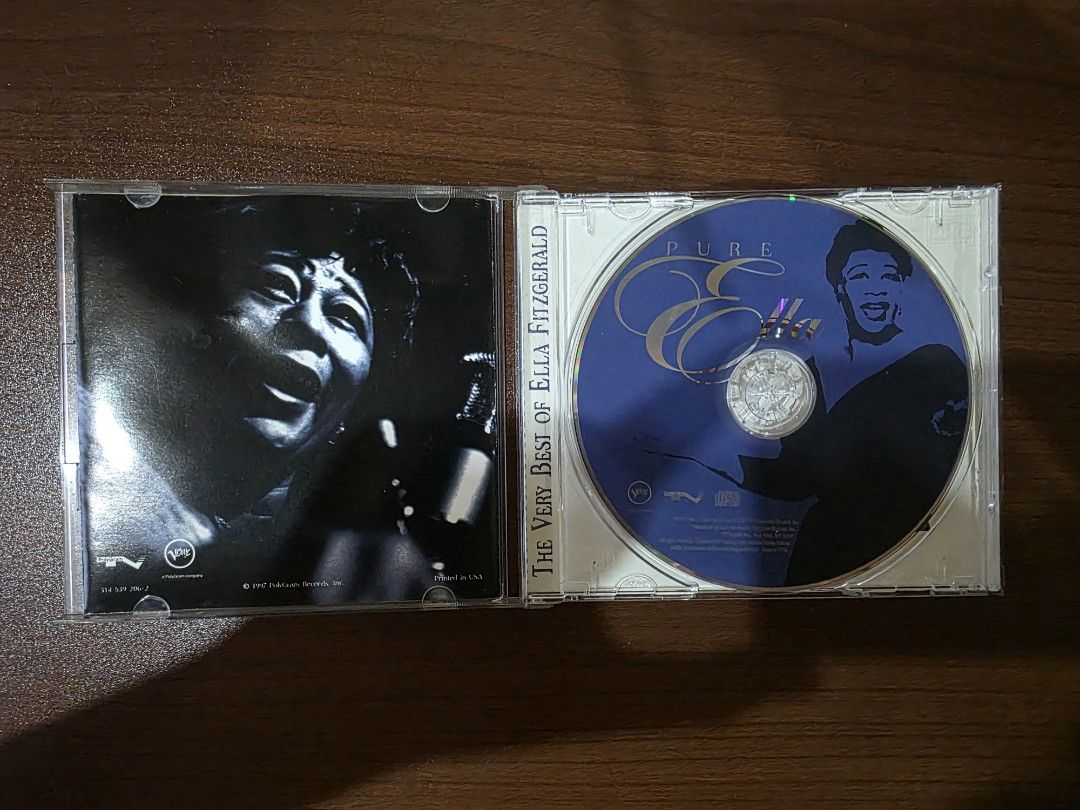 Ella Fitzgerald - Pure Ella (CD) (Category: CDs & DVDs) located in Camalig. Submitted by kyoudayo (Listing ID 1467706587, Image 3). Description: - Title: Ella Fitzgerald - Pure Ella, The Very Best of Ella Fitzgerald - Genre: Classic jazz featuring her iconic vocals - Condition: VG+, some cracks on jewel case - Ideal for: Jazz enthusiasts and physical music collectors.