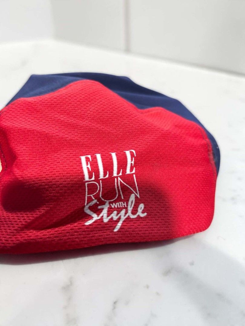 Elle Run With Style Cap Blue Red (Category: Caps & Hats) located in Iloilo. Submitted by rapha.houseofactivewear.23 (Listing ID 1467642312, Image 3). Description: - Brand/Style: Elle Run With Style Cap - Colorway: Blue, red, and cream - Front Design: 'Together for More' graphic - Breathability: Mesh side panels - Fit: Adjustable strap closure at the back - Comfort: Interior sweatband lining - Material: Lightweight athletic material - Best For: Ru
