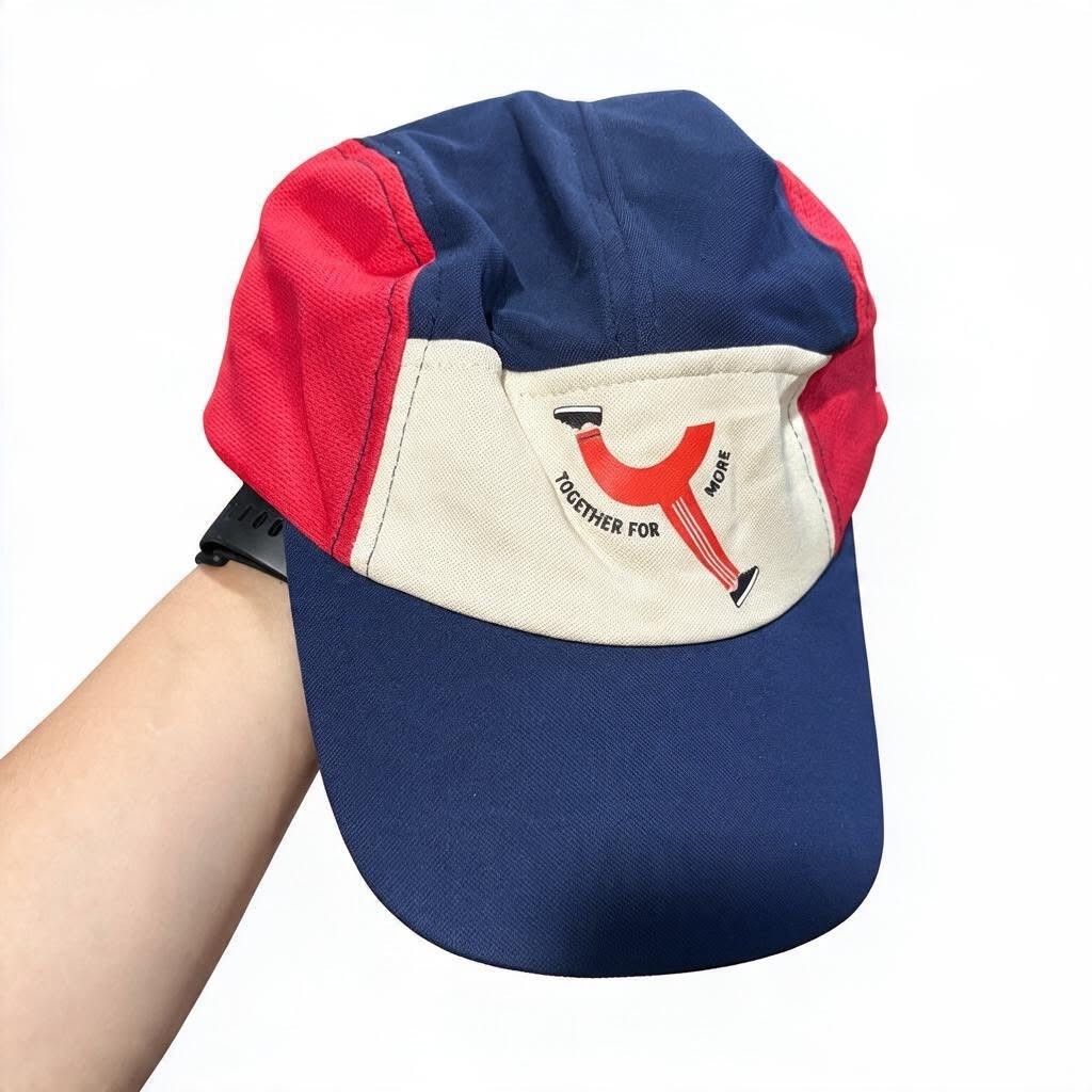 Elle Run With Style Cap Blue Red (Category: Caps & Hats) located in Iloilo. Submitted by rapha.houseofactivewear.23 (Listing ID 1467642312, Image 1). Description: - Brand/Style: Elle Run With Style Cap - Colorway: Blue, red, and cream - Front Design: 'Together for More' graphic - Breathability: Mesh side panels - Fit: Adjustable strap closure at the back - Comfort: Interior sweatband lining - Material: Lightweight athletic material - Best For: Ru