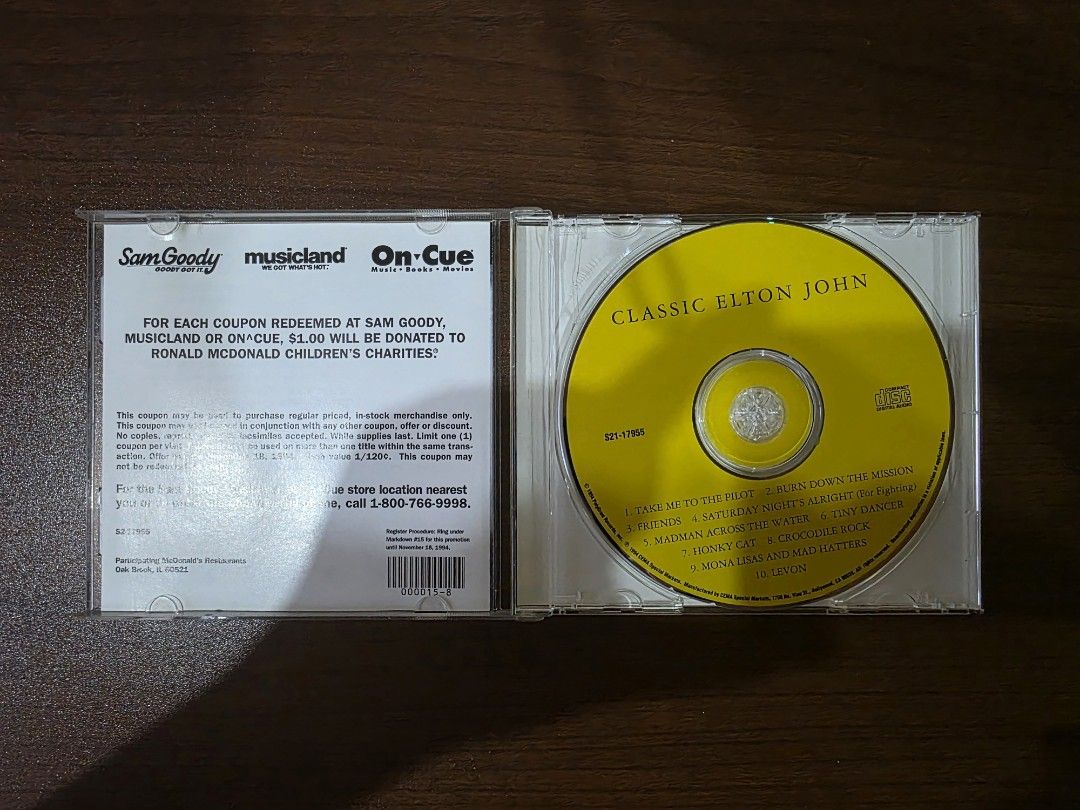 Elton John - Classic Elton John (CD) (Category: CDs & DVDs) located in Camalig. Submitted by kyoudayo (Listing ID 1467700754, Image 3). Description: - Title: Classic Elton John Music Album - Release: 1994 by CEMA Special Markets - Tracklist: Includes 10 hits like Tiny Dancer, Crocodile Rock, and Saturday Night's Alright - Bonus: Includes rare vintage promo insert from Sam Goody, Musicland, and On-Cue - Condition: VG+, some cracks on jewel case.