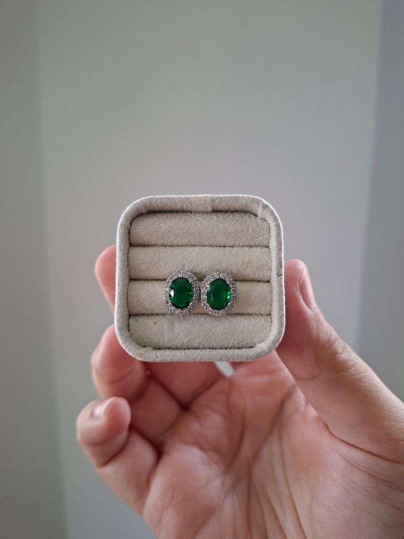 Emerald Stone Oval Silver Stainless Steel Stud Earrings (Category: Earrings) located in Dasmarinas. Submitted by danabrie22 (Listing ID 1467832164, Image 3). Description: very well-made, excellent crafstmanship 10/10 condition brand new stainless steel & colored cubic zirconia stones made in Hongkong.