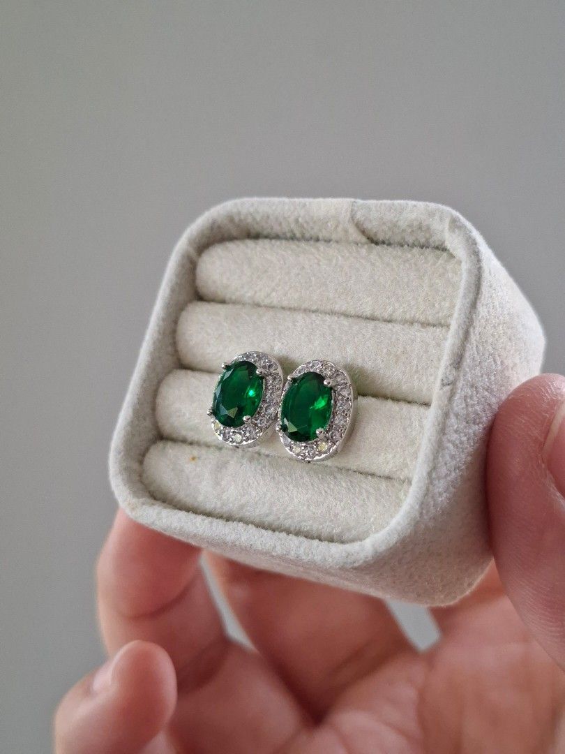 Emerald Stone Oval Silver Stainless Steel Stud Earrings (Category: Earrings) located in Dasmarinas. Submitted by danabrie22 (Listing ID 1467832164, Image 2). Description: very well-made, excellent crafstmanship 10/10 condition brand new stainless steel & colored cubic zirconia stones made in Hongkong.