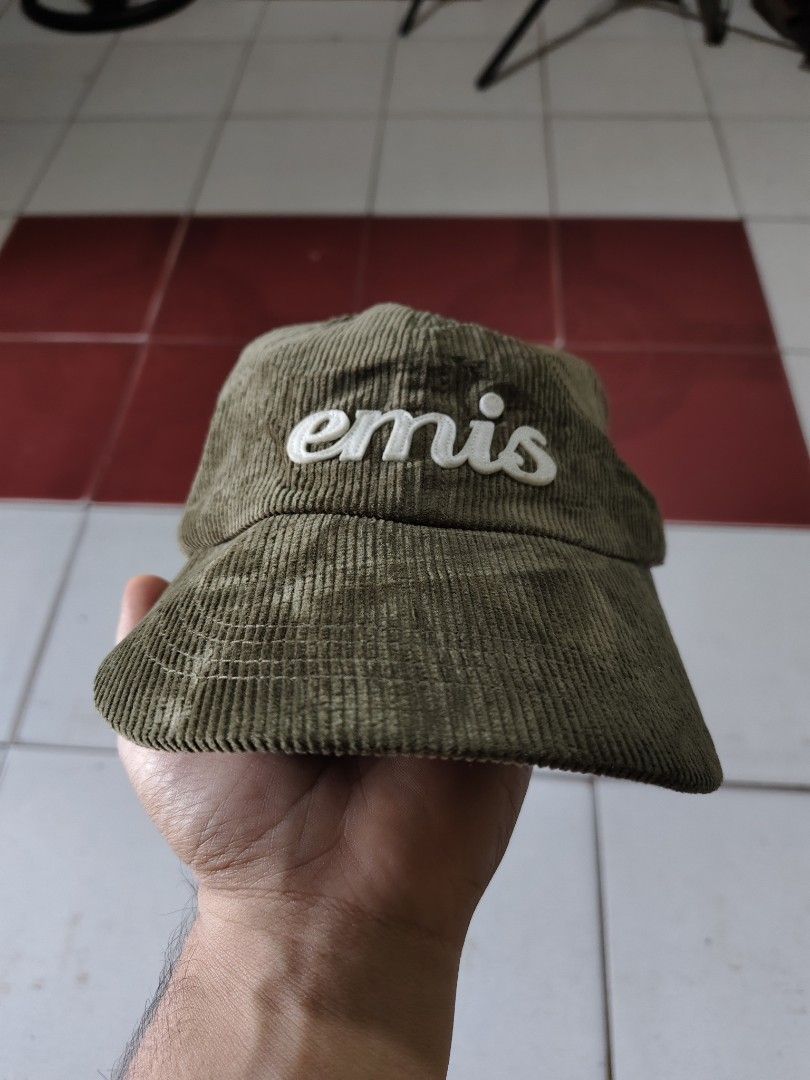 EMIS Corduroy Cap Olive Green (Category: Caps & Hats) located in Andop. Submitted by sionyzoerhoin191326 (Listing ID 1467605602, Image 1). Description: - Brand: EMIS - Style: Corduroy cap - Color: Olive green with white embroidered logo - Material: 100% cotton - Closure: Adjustable metal strap at the back - Origin: Made in Vietnam (Mfg: Sept 2024) - Condition: Clean, excellent everyday wear.