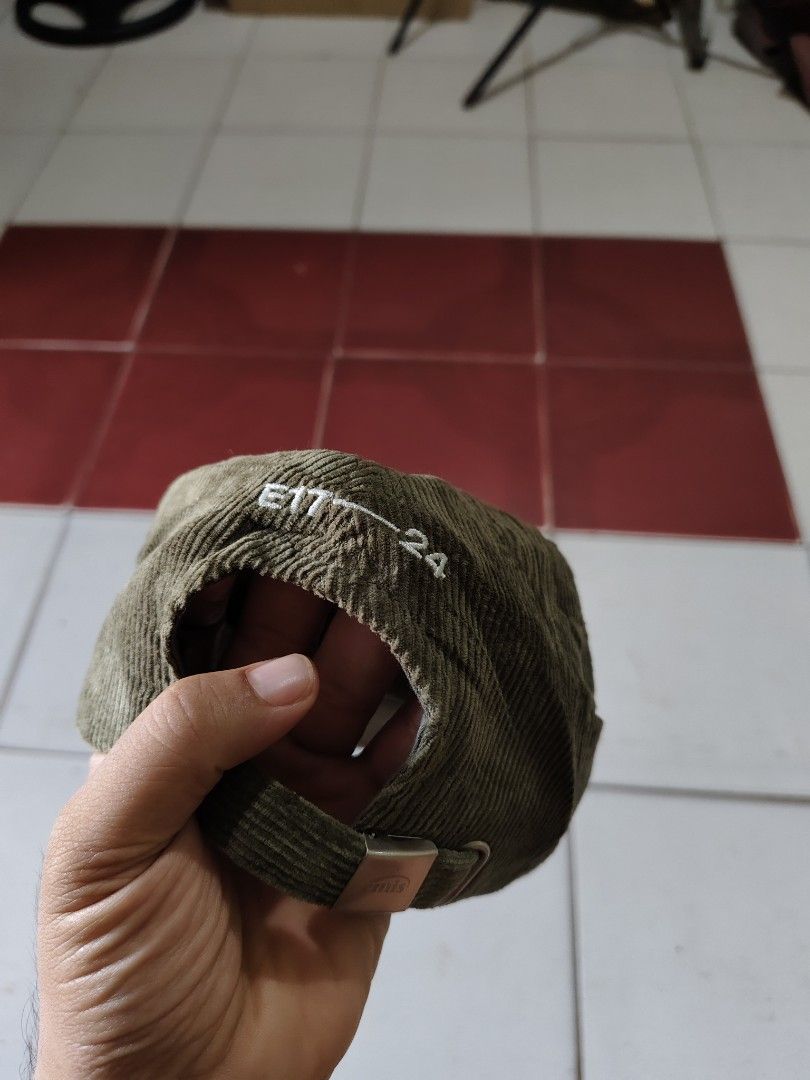 EMIS Corduroy Cap Olive Green (Category: Caps & Hats) located in Andop. Submitted by sionyzoerhoin191326 (Listing ID 1467605602, Image 3). Description: - Brand: EMIS - Style: Corduroy cap - Color: Olive green with white embroidered logo - Material: 100% cotton - Closure: Adjustable metal strap at the back - Origin: Made in Vietnam (Mfg: Sept 2024) - Condition: Clean, excellent everyday wear.