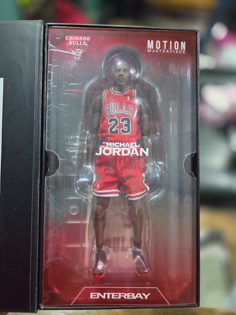 Enterbay Masterpiece Michael Jordan 1/9 scale (Category: Figurines & Statues) located in Manila. Submitted by artbag2606 (Listing ID 1467837842, Image 2). Description: MJ 1/9 scale Enterbay - Brand/Model: Enterbay Motion Masterpiece Michael Jordan Action Figure - Team/Jersey: Chicago Bulls Red Jersey, #23 - Authenticity: Upper Deck Authenticated memorabilia box included - Inclusions: Original packaging and manual - Condition: Highly detailed coll