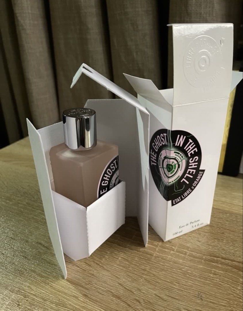 Etat Libre d'Orange The Ghost In The Shell 100ml (Category: Fragrance & Deodorants) located in Quezon City. Submitted by kirez (Listing ID 1467633324, Image 2). Description: Authentic! Etat Libre d'Orange The Ghost In The Shell fragrance. 100ml bottle, Eau de Parfum concentration. Embossed lettering along the side glass. Chrome spray nozzle and metallic cap with engraved top detailing. Original white outer packaging included. .