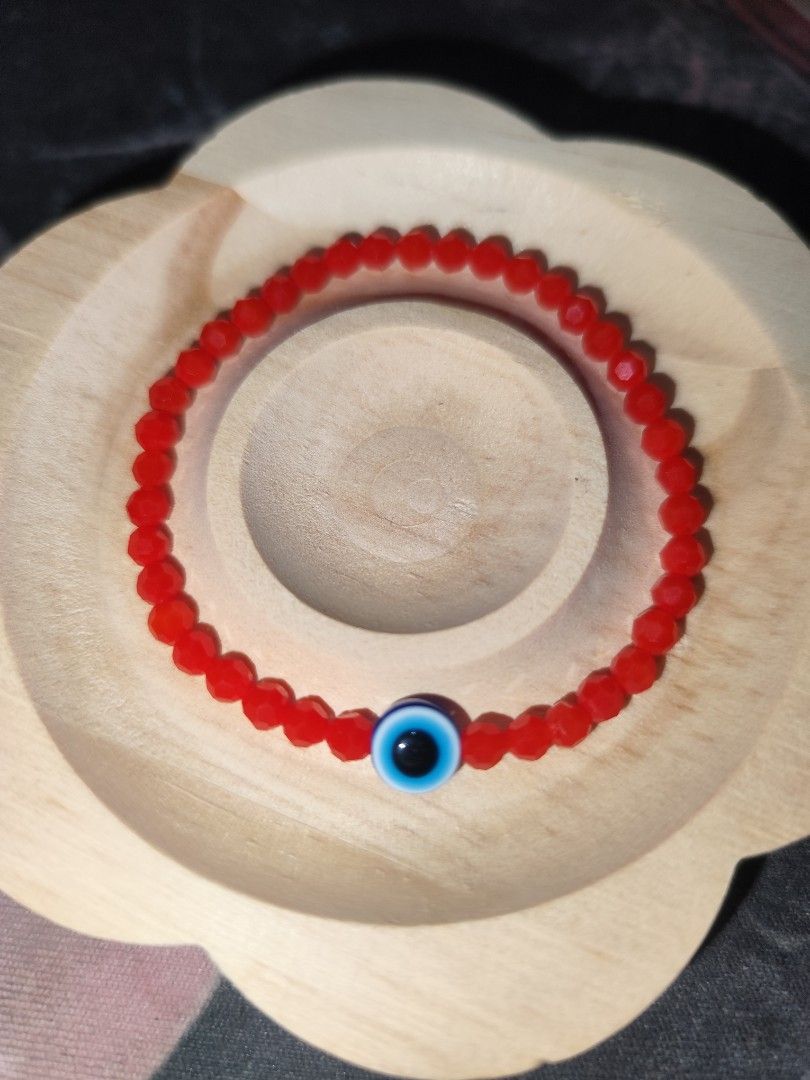 Evil Eye Beaded Bracelets Protection Good Energy (Category: Bracelets) located in Naga. Submitted by semflewer (Listing ID 1467649390, Image 2). Description: - Handmade evil eye bead bracelets designed for luck, love, protection, and focus - Available in 4 styles: 3mm red crystal, 4mm black macaroni, 4mm white macaroni, and 6mm red crystal - Prices range from PHP 59 to PHP 139 per piece - Special discounts apply for bulk orders of 3 pieces and ab