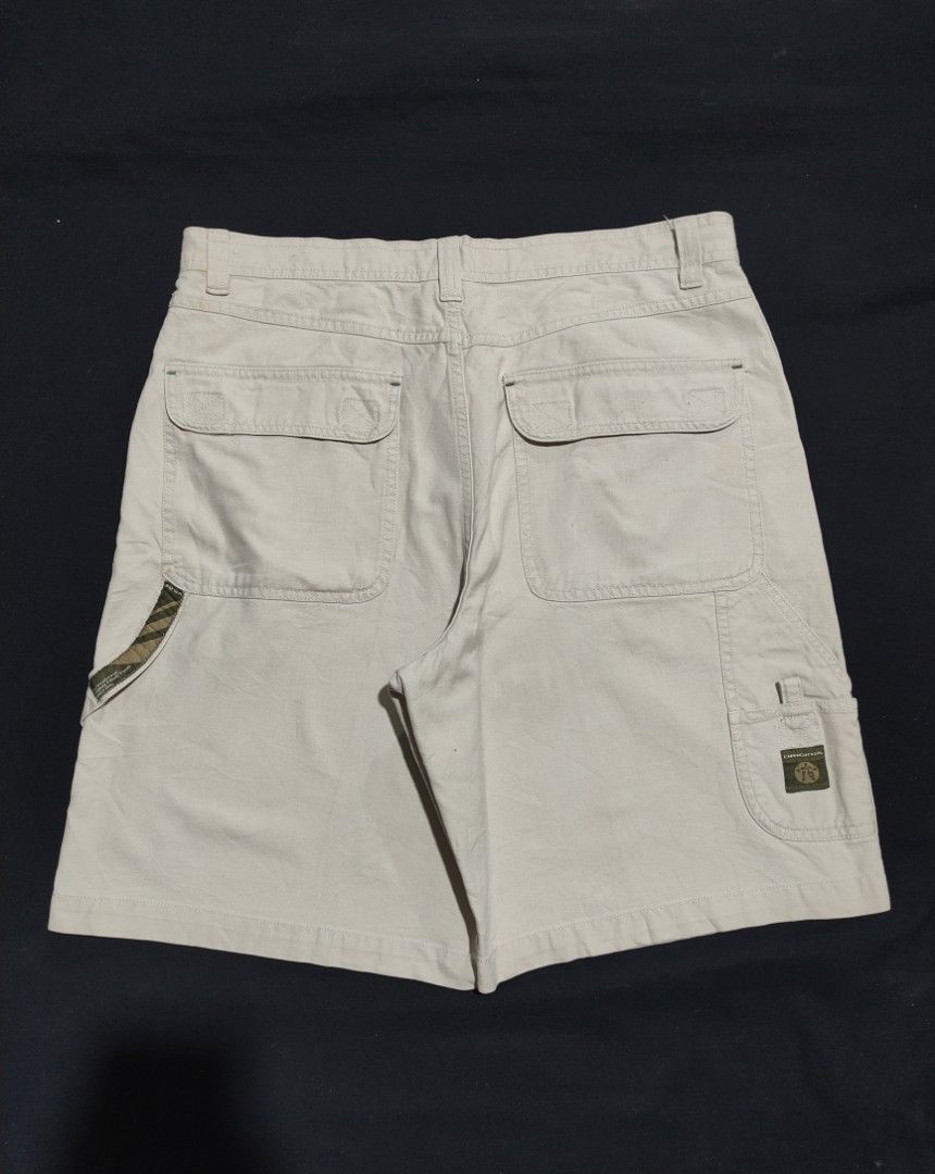 Faded Glory Stone Cargo Shorts Size 34 (Category: Shorts) located in Binan City. Submitted by mmrl_rmwl00 (Listing ID 1467794918, Image 2). Description: Faded Glory cargo shorts in stone colour. Made from 100% cotton canvas material. Men's size 34 waist. Button closure and zippered fly. Multiple pockets including utility and back flap pockets with branded logo patches. Casual style for everyday wear..