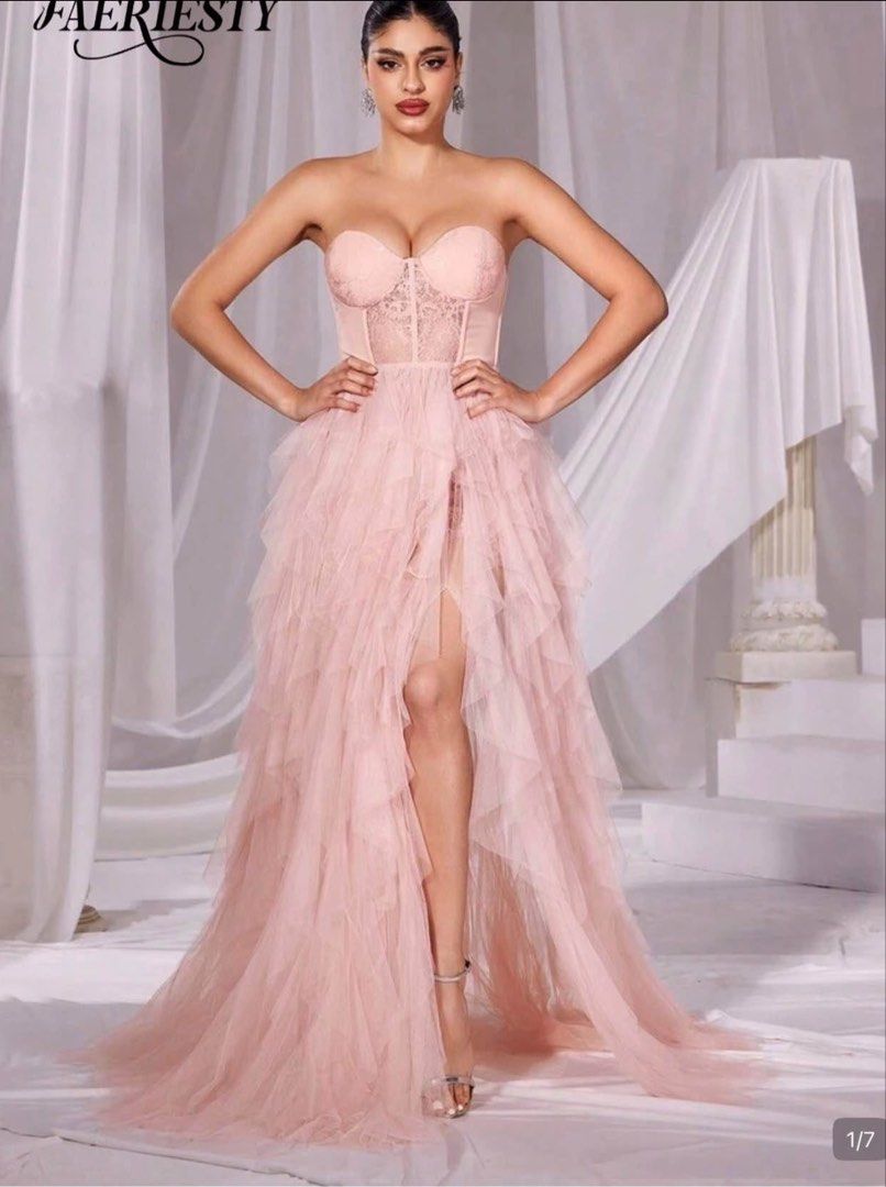 Faeriesty Pink Strapless Ruffle Tulle High Split Gown (Category: Evening dresses & gowns) located in Tagaytay City. Submitted by reapersix (Listing ID 1467750059, Image 3). Description: Pink fairy gown Xs - small size Used once Selling for 1,500 Slightly negotiable. .