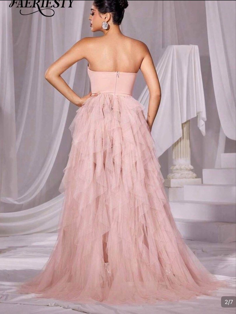 Faeriesty Pink Strapless Ruffle Tulle High Split Gown (Category: Evening dresses & gowns) located in Tagaytay City. Submitted by reapersix (Listing ID 1467750059, Image 2). Description: Pink fairy gown Xs - small size Used once Selling for 1,500 Slightly negotiable. .