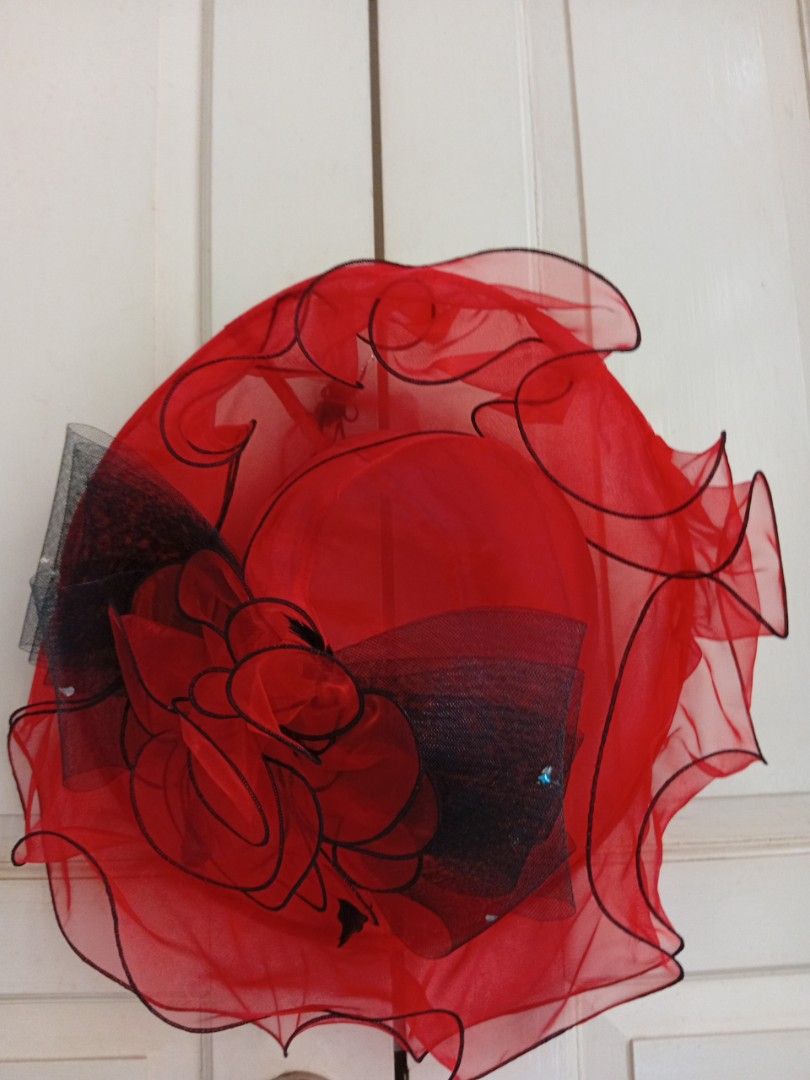 Fancy red hat (Category: Hats & Beanies) located in Singapore. Submitted by blackjack8 (Listing ID 1467622012, Image 2). Description: - Striking red hat with elegant black mesh and floral accents - Eye-catching design featuring ruffled brims and delicate details - Great for weddings, garden parties, or festive celebrations - Meetup available at Outram Park MRT (White hat available also. See photo 5 and in my lists) Fast deal. take both colours at