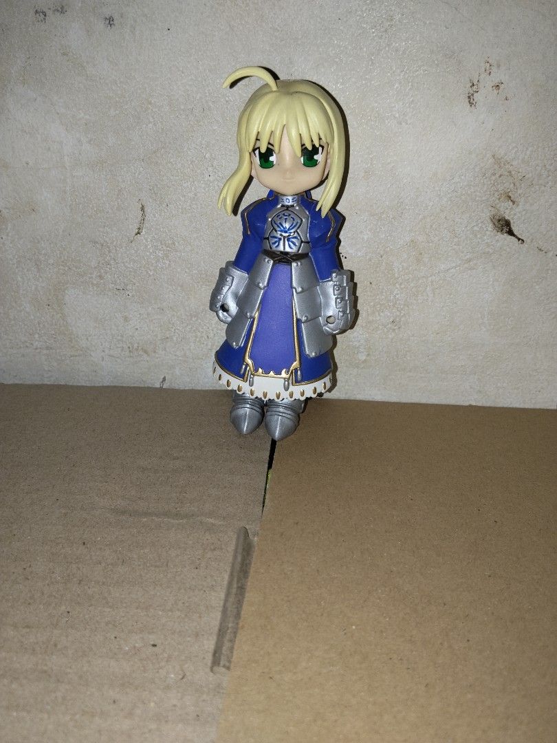 Fate Grand Order Figure Bundle (Category: Figurines & Statues) located in Manila. Submitted by castergil (Listing ID 1467712420, Image 3). Description: - Official Fate/Grand Order merchandise collection - Includes: Sakura Matou white dress figure, Artoria Pendragon chibi, Ritsuka Fujimaru figure, and Jeanne d'Arc plush keychain - Note: Original boxes are missing - Perfect set for FGO collectors and fans looking to expand their display.