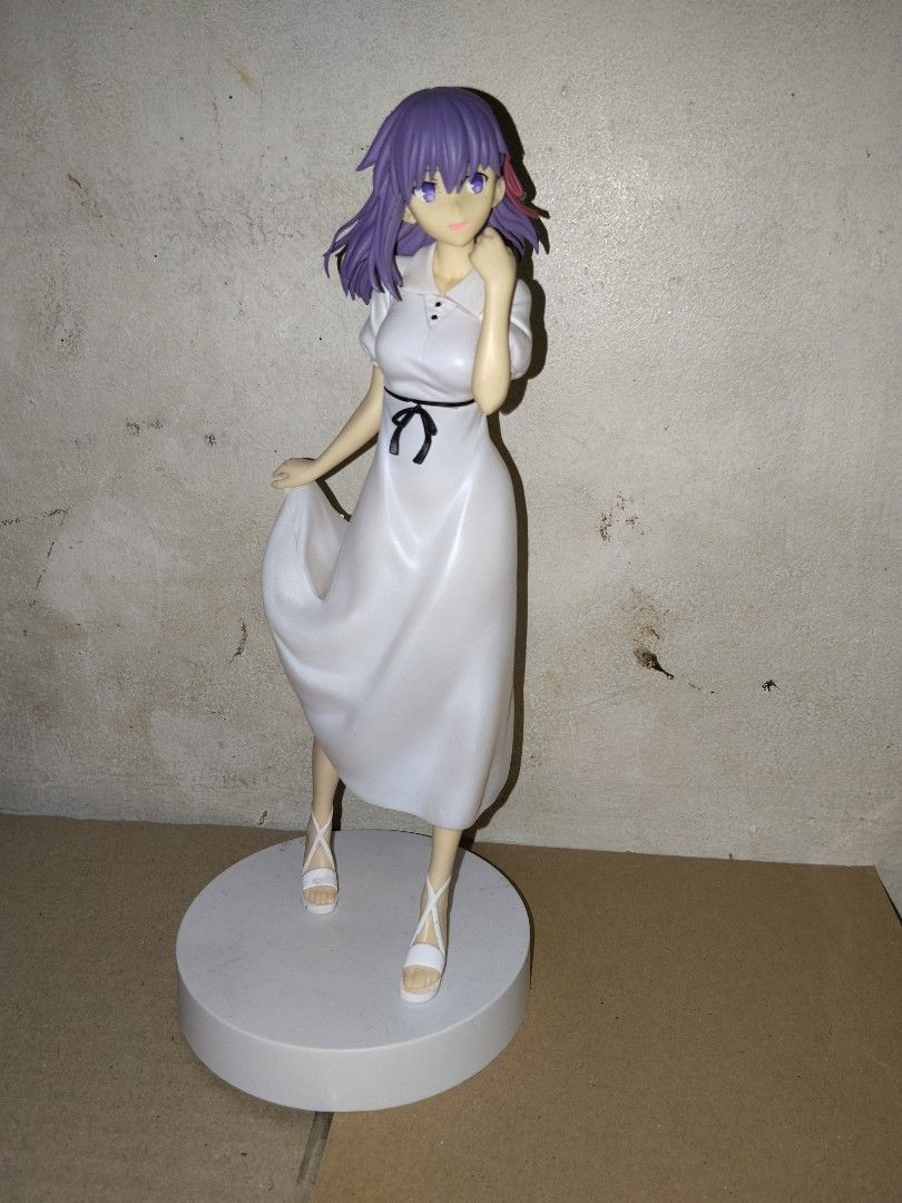 Fate Grand Order Figure Bundle (Category: Figurines & Statues) located in Manila. Submitted by castergil (Listing ID 1467712420, Image 2). Description: - Official Fate/Grand Order merchandise collection - Includes: Sakura Matou white dress figure, Artoria Pendragon chibi, Ritsuka Fujimaru figure, and Jeanne d'Arc plush keychain - Note: Original boxes are missing - Perfect set for FGO collectors and fans looking to expand their display.