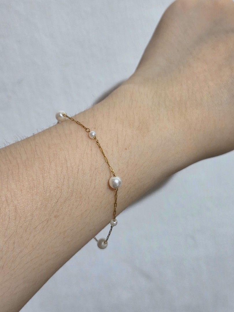 Faux Pearl Gold Bracelet (Category: Bracelets) located in Quezon City. Submitted by pwinx (Listing ID 1467760015, Image 1). Description: - hypoallergenic - non-tarnish - stainless - faux pearls.