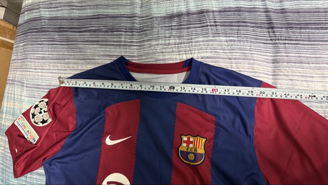 FC Barcelona Home Jersey Nike Spotify UEFA Foundation Patch (Category: Activewear) located in Quezon City. Submitted by kobeeeee_12 (Listing ID 1467643297, Image 2). Description: - Authentic FC Barcelona home jersey - Features Spotify sponsor logo and UEFA Foundation sleeve patch - Iconic blue and garnet vertical stripes - Embroidered Nike swoosh and club crest - Short sleeves with crew neck - Condition: Excellent, message for inquiries!.