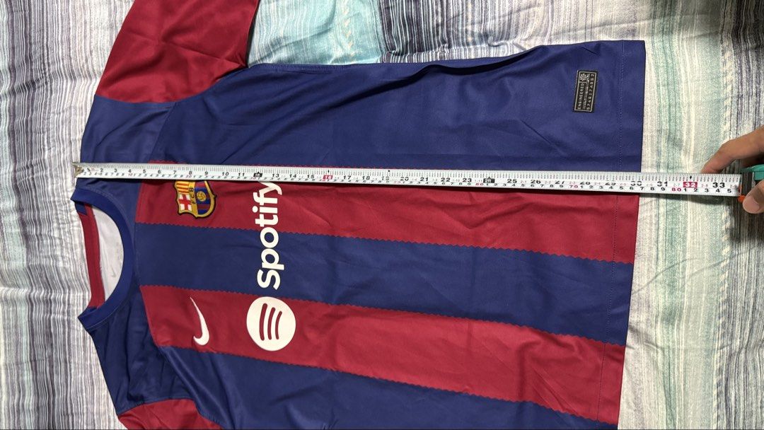 FC Barcelona Home Jersey Nike Spotify UEFA Foundation Patch (Category: Activewear) located in Quezon City. Submitted by kobeeeee_12 (Listing ID 1467643297, Image 3). Description: - Authentic FC Barcelona home jersey - Features Spotify sponsor logo and UEFA Foundation sleeve patch - Iconic blue and garnet vertical stripes - Embroidered Nike swoosh and club crest - Short sleeves with crew neck - Condition: Excellent, message for inquiries!.