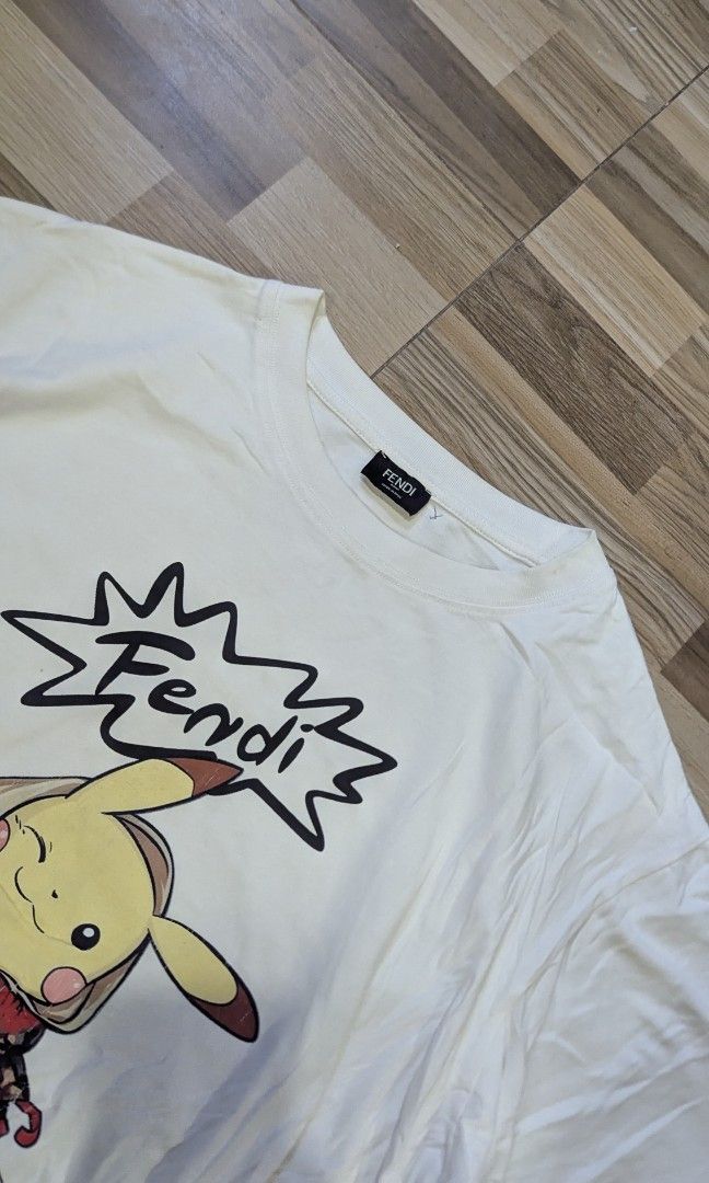Fendi Pikachu T-shirt (Category: Luxury Apparel) located in Pasay City. Submitted by aatapparelshop (Listing ID 1467701057, Image 3). Description: Fendi Pikachu T-shirt size large dimes L25 W22 GOOD CONDTION 1600 SHIPED.