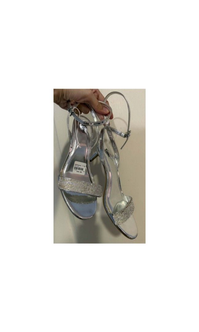Fioni Silver Heels (Category: Heels) located in Legazpi City. Submitted by alyblueberyl (Listing ID 1467610991, Image 1). Description: Brandew/ Never worn Size 7 1/2 2inch heel No box included Padala from Canada.