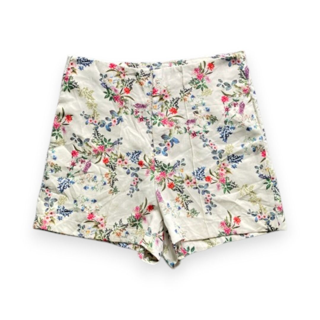 Floral High-Waisted Shorts (Category: Shorts) located in Rizal. Submitted by sheeraay (Listing ID 1467672416, Image 1). Description: - Style: High-waisted shorts with tailored front seams for a structured fit - Pattern: Vibrant floral print (pink, red, and blue flowers with green leaves) on a white background -waistlinw up to 15 inches - Fabric: Lightweight and breathable, ideal for warm weather - Condition: Excellent, ready to wear - Perfect for