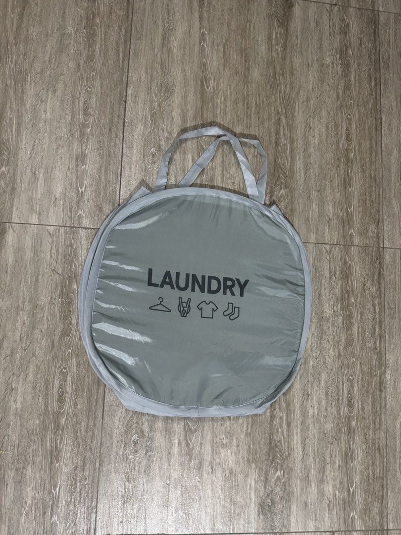 Foldable grey mesh laundry hamper (Category: Laundry Baskets) located in Quezon City. Submitted by thshxn21 (Listing ID 1467761734, Image 1). Description: ITEM DETAILS & SELLING TERMS * RFS: Decluttering SHIPPING & PAYMENT * Delivery: Lalamove only (Buyer shoulders the shipping fee) * Payment via GCash / Bank Transfer PLEASE READ BEFORE BUYING * Pre-loved/Used unless stated otherwise. Please manage your expectations * Colors may slightly vary due