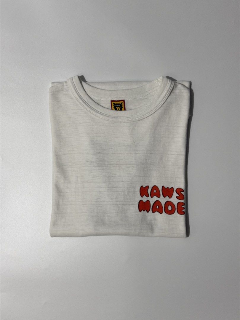 For sale (Category: Tshirts & Polo Shirts ) located in Marikina City. Submitted by skkagawad041591 (Listing ID 1467616480, Image 1). Description: Human made x kaws Size large Dimension Width 20.5 | Length 28 Good as new 💯.