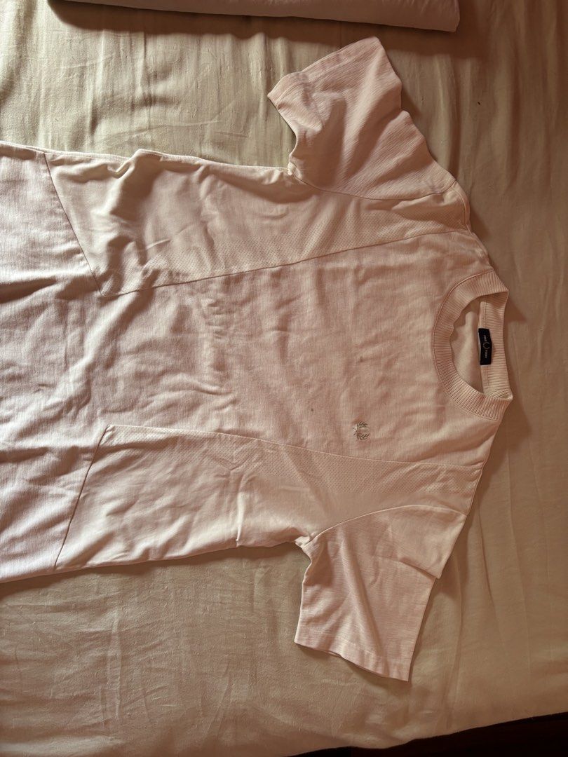 Fred Perry Cream Panel T-Shirt (Category: Tshirts & Polo Shirts ) located in Manila. Submitted by zxcvbnm_100 (Listing ID 1467645058, Image 1). Description: - Brand: Fred Perry - Color: Cream - Design: Paneled fabric with subtle front texture details - Logo: Iconic embroidered laurel wreath on the chest - Fit: True to size, regular short sleeves with ribbed collar - Condition: Excellent, clean look perfect for casual wear - Location: Metro Manila