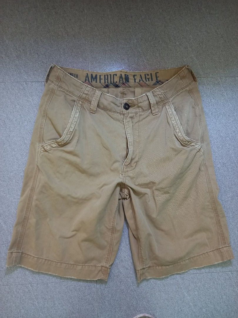 American Eagle Khaki Shorts Size 33 (Category: Shorts) located in Panabo. Submitted by khimmyirish_ki021126 (Listing ID 1467697846, Image 1). Description: - Brand: American Eagle - Size: 33 waist - Color: Khaki - Material: 100% cotton (Made in Bangladesh) - Features: Button fly, front and back pockets, stylish plaid lining inside the waistband - Care: Machine washable - Condition: Pre-loved, well-maintained.