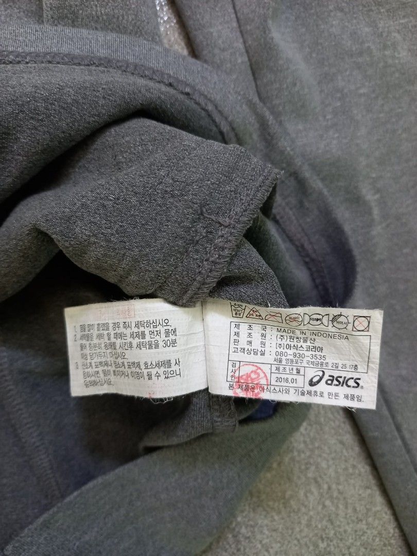 Free shipping Asics Grey Athletic Zip-Up Track Jacket (Category: Coats, Jackets and Outerwear) located in Panabo. Submitted by khimmyirish_ki021126 (Listing ID 1467694557, Image 2). Description: - Brand: Asics - Color: Grey with bright pink accents - Size: Chest approx. 20" across - Features: Full zip, 2 zippered pockets, high contrast collar - Origin: Made in Indonesia (2016) - Condition: Excellent, comfortable layer for running, gym, or casual 