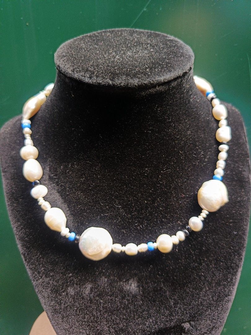 Fresh Water Baroque Pearl (Category: Necklaces) located in Manila. Submitted by randolf7285 (Listing ID 1467658558, Image 1). Description: irregular white freshwater baroque and coin pearls accented with small dark and bright blue seed or gemstone beads..