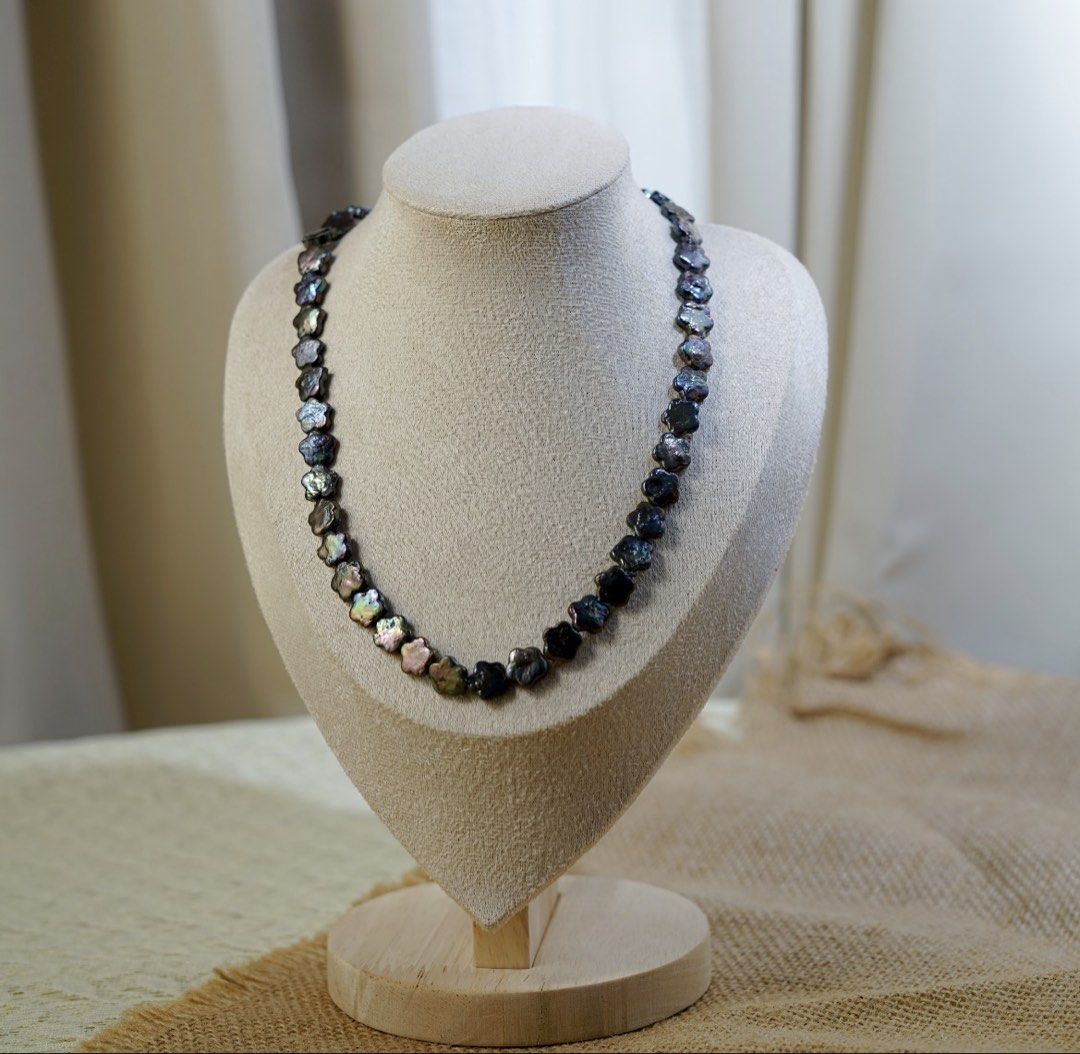 Freshwater flower shape pearl (Category: Necklaces) located in Lipa City. Submitted by avenueusco_ph (Listing ID 1467633855, Image 1). Description: They are flower-shaped coin pearls. 🌸 Dark charcoal-black body color with oil-slick peacock overstone ✨ 10.1mm 18” long .