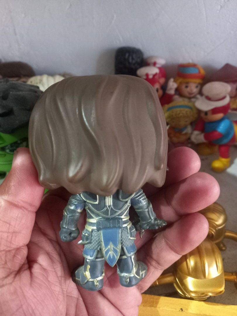 Funko Pop Vinyl Figure War craft Character Lothar (Category: Designer & Blind Box Toys) located in Manila. Submitted by cristobalc40322 (Listing ID 1467688663, Image 3). Description: - Item: Funko Pop Vinyl Collectible Figure - Details: Brown hair, detailed medieval armor, holding a sword - Authenticity: Stamped Funko LLC 2013, made in China (Code: A323) - Style: Standard bobblehead vinyl figurine - Condition: Pre-owned with minor scuffs and pain