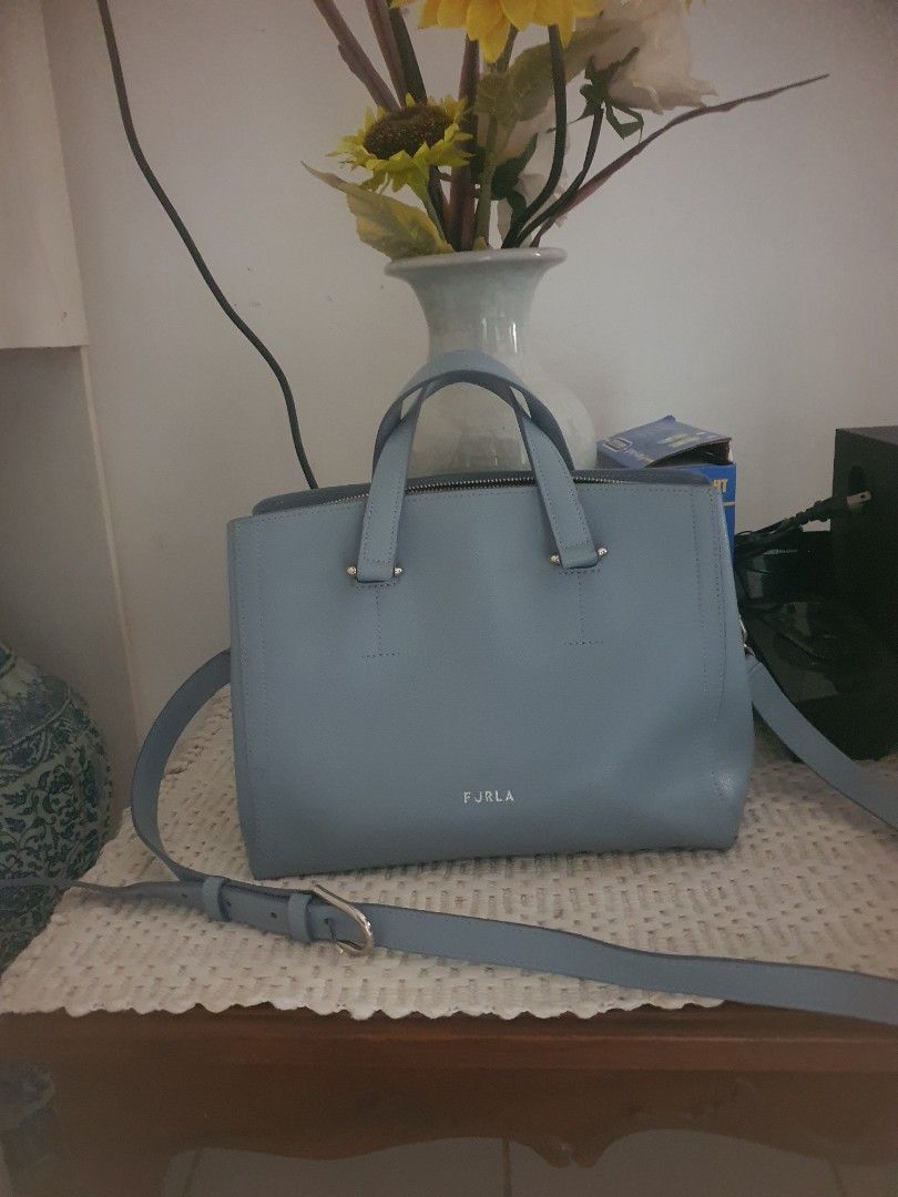 Furla pure leather (Category: Cross-body Bags) located in Trece Martires City. Submitted by thriftollshoppe (Listing ID 1467679309, Image 1). Description: .